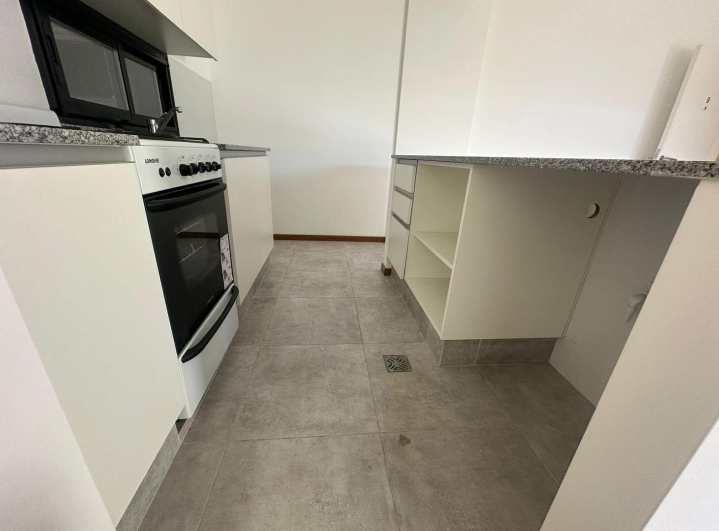 Foto de VENTA DEPARTAMENTO 2 DORMITORIOS CON COCHERA LOS PASOS - PARRILLA EN EL, imagen 2