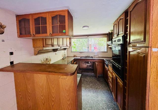 Foto de VENTA - CASA CINCO DORMITORIOS CON PATIO A REFACCIONAR - FISHERTON, imagen 1