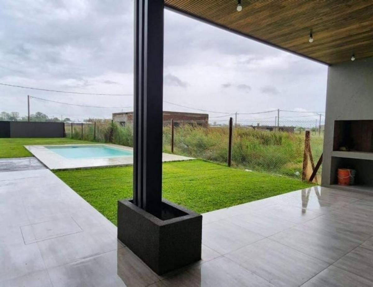 Casa 3 Dorm. con Pileta La Finca Ibarlucea 5