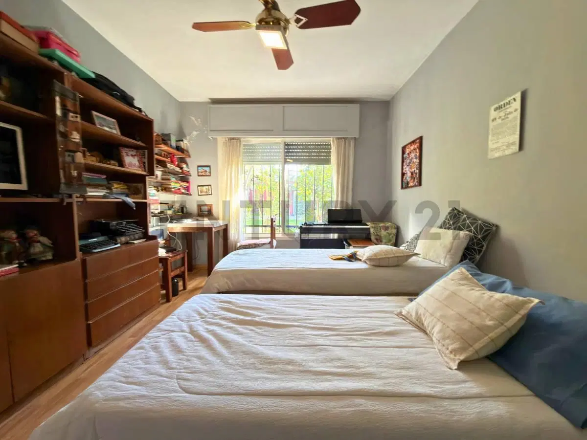 Venta Casa de 3 Dormitorios con cochera, patio y quincho en barrio Belgrano, Rosario 5