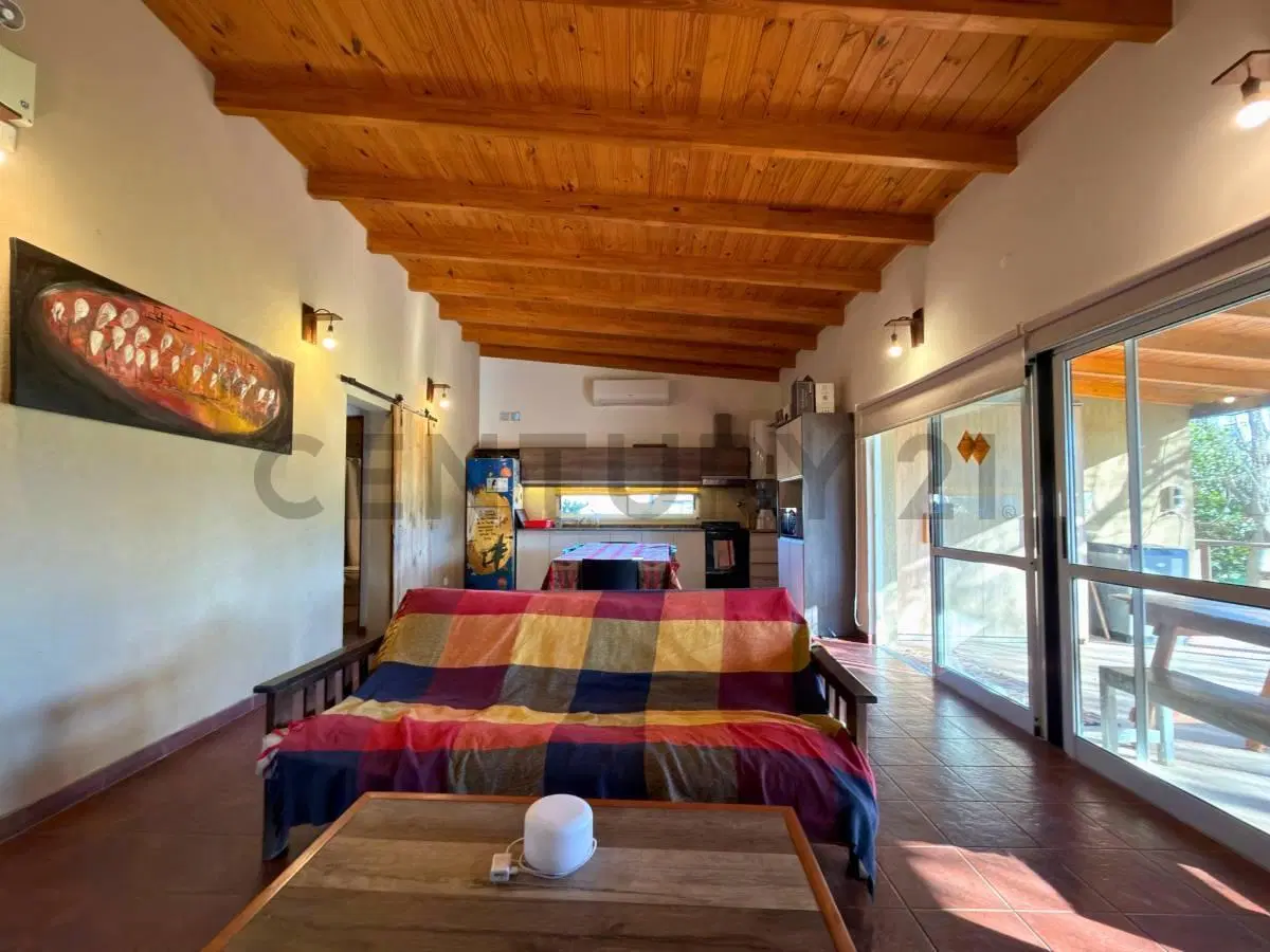 Venta | Casa de 2 Dormitorios con jardín y pileta en Punta Chacra, Roldán 8