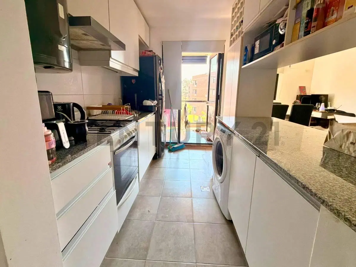 Venta Departamento de 2 Dormitorios + Cochera en Palos Verdes 1