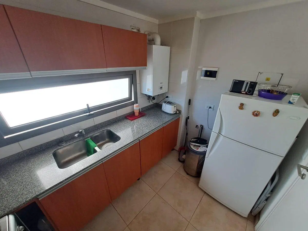 Vende moderno monoambiente frente balcon cochera 2