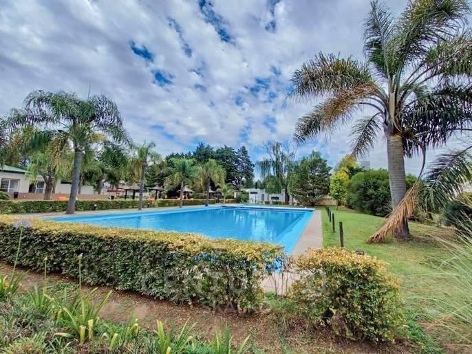 lote en Barrio Cerrado Sol Paraná, Pueblo Esther LOTE EN BARRIO CERRADO SOL PARANÁ, PUEBLO ESTHER Lote N° 22 . Con una superficie de 616 m2 19 metros de Frente x 32,4 metros de Fondo. Barrio con Red Eléctrica subterránea,fibra óptica, conexión de Gas y Cloacas.El presente Barrio incluye Club House y Piscina,áreas verdes de esparcimiento, áreas de circulación y superficies destinadas a la práctica deportiva, juegos infantiles, cancha de futbol y tenis sintético, cancha de golf de 6 hoyos, gimnasio, SUM y parrillero. -Seguridad las 24 hs. Ubicado en Pueblo Esther, sobre la ruta A012, a 2 km de la autopista Rosario - Bs As. A 20 minutos del centro de la ciudad de Rosario, con accesibilidad desde autopista y desde la ruta 9. Leer descripción completa ¿Cómo evitar fraudes inmobiliarios? 3