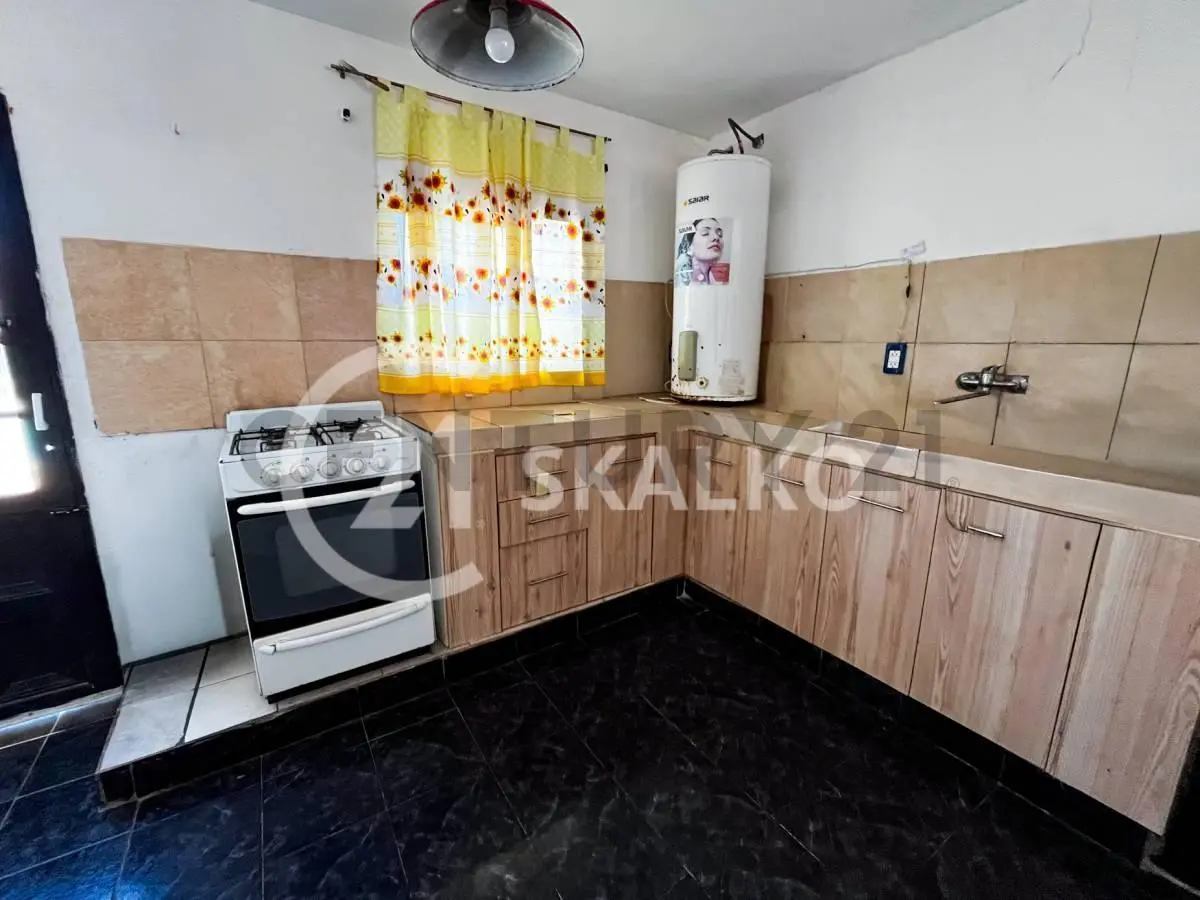 VENTA CASA DOS DORMITORIOS CON PILETA VILLA MUGUETA SANTA FE 4