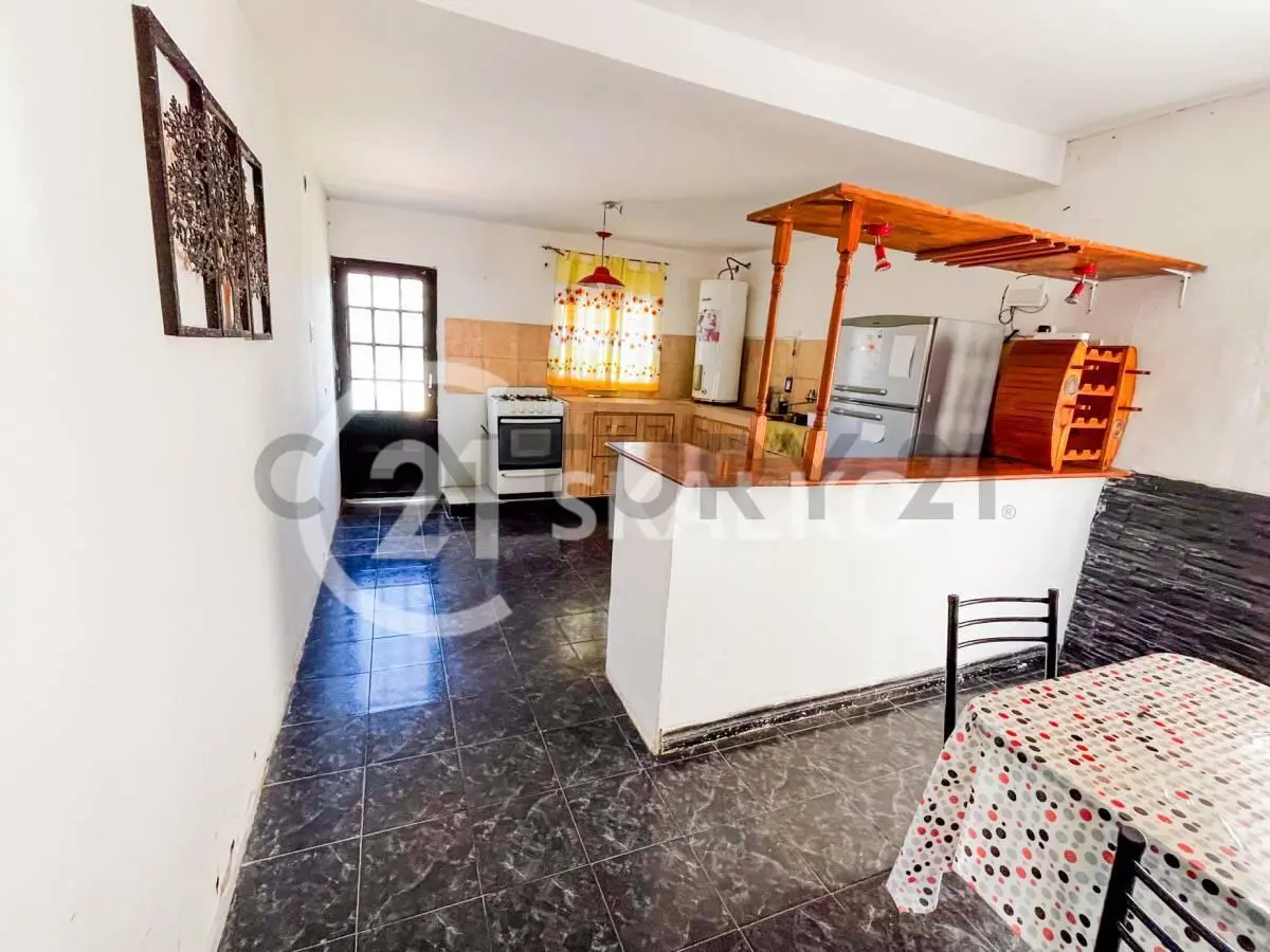 VENTA CASA DOS DORMITORIOS CON PILETA VILLA MUGUETA SANTA FE 3