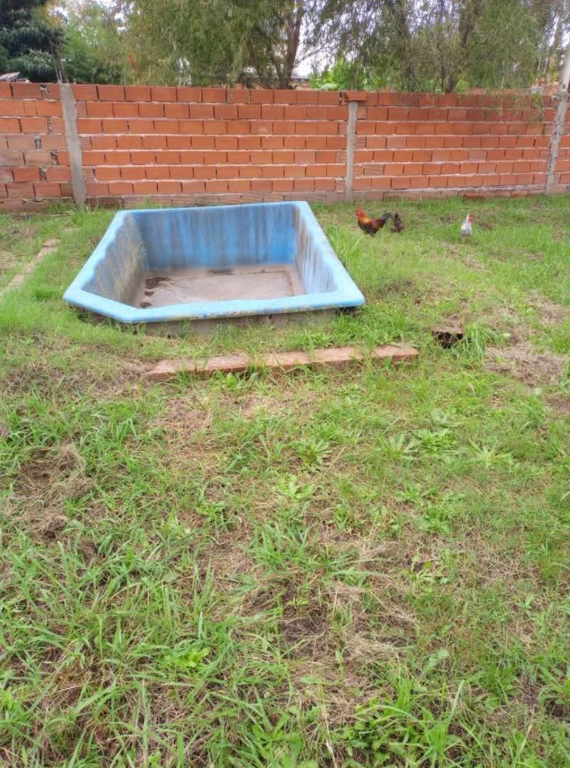Foto de TERRENO EN LOS PIONEROS CON CONSTRUCCION A TERMINAR, imagen 1