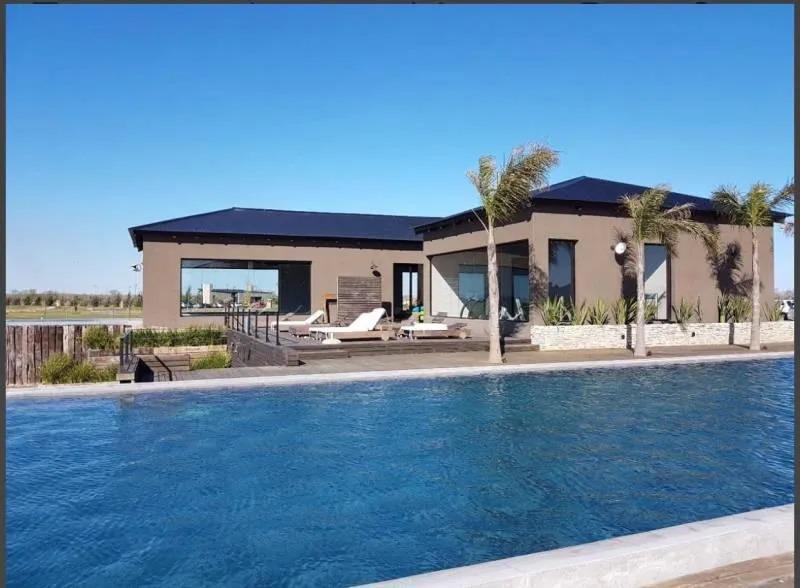 Foto de MMC. Venta lote a la laguna en barrio El Naudir, imagen 2