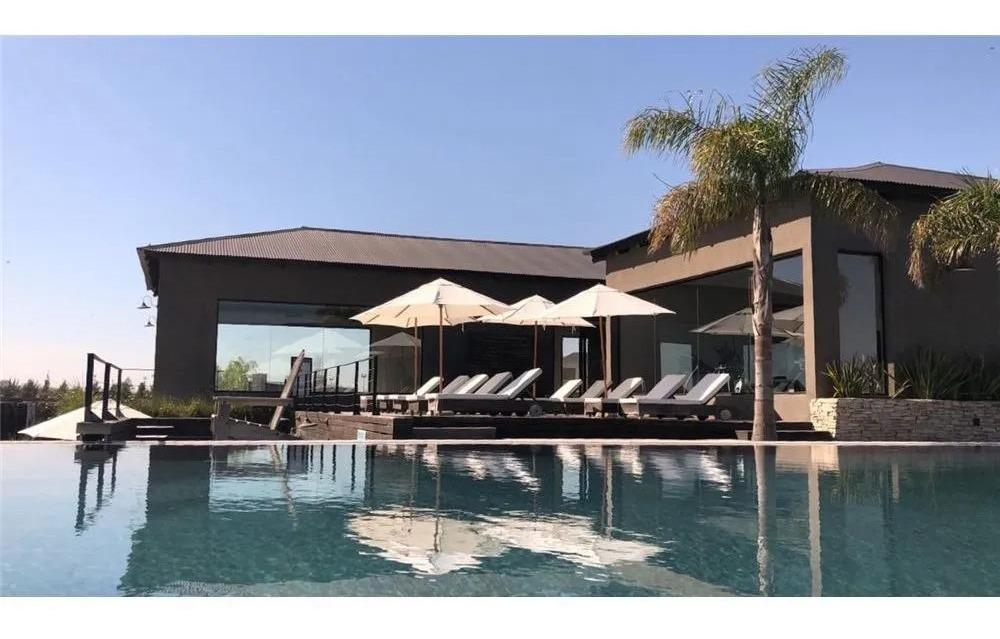 Foto de MMC. Venta lote a la laguna en barrio El Naudir, imagen 4