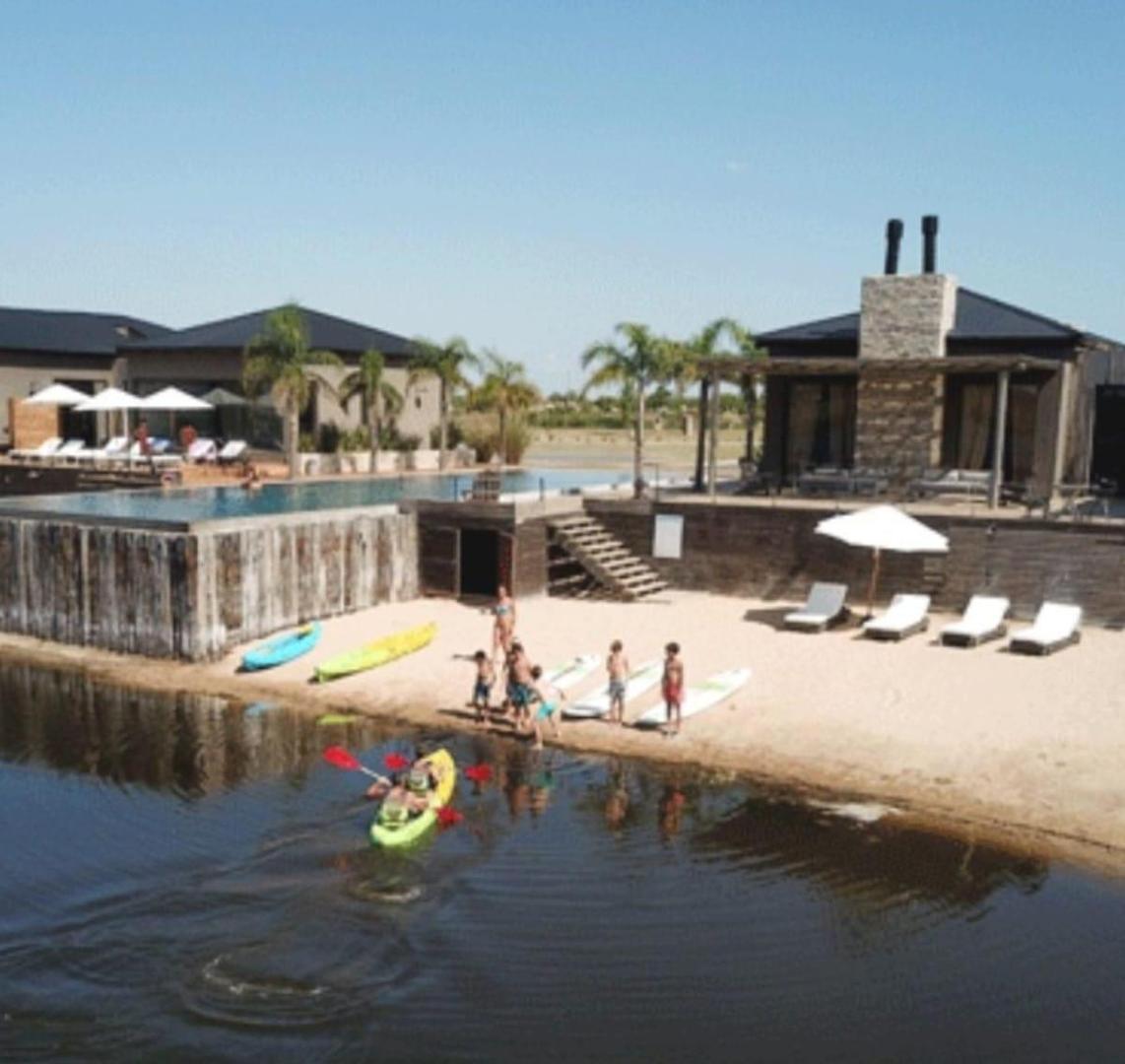 GLM. VENTA LOTE AL RIO EN NAUDIR AGUAS PRIVADAS