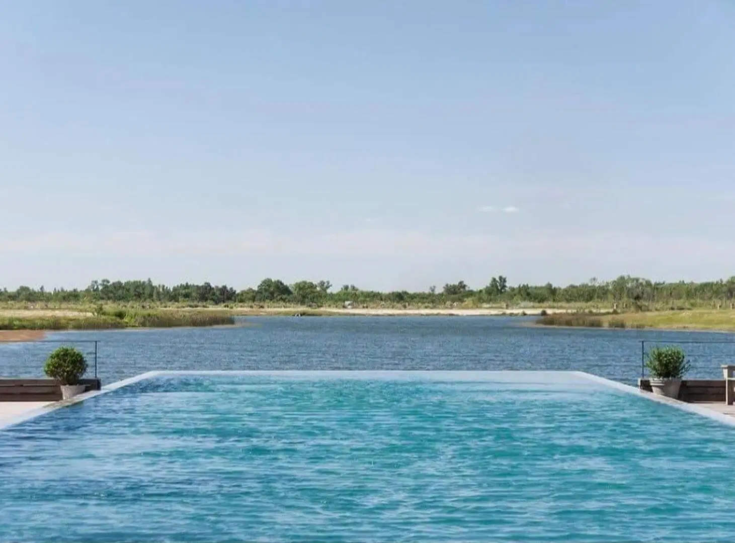 GLM. VENTA LOTE AL RIO EN NAUDIR AGUAS PRIVADAS 2
