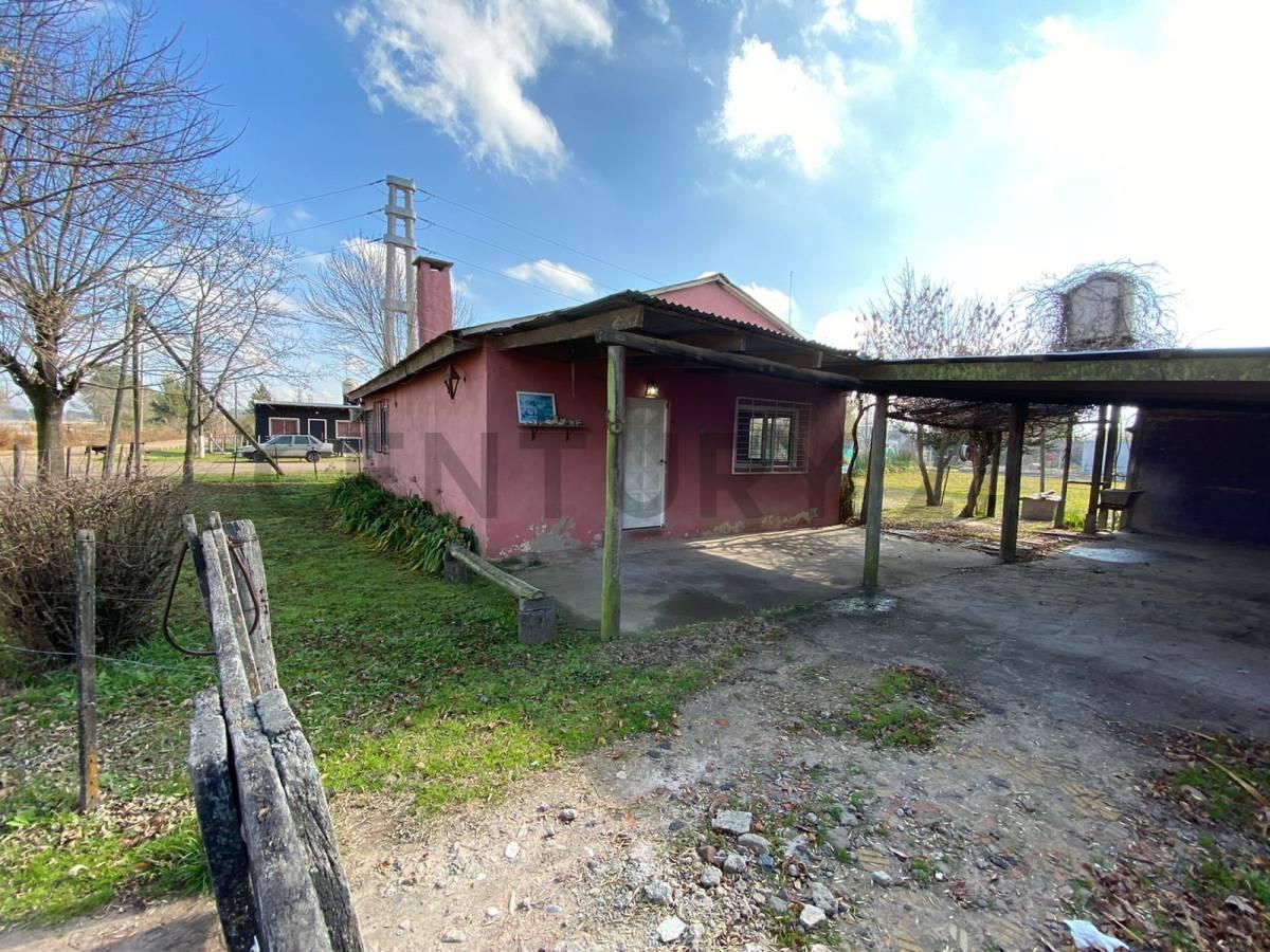 Foto de casa en venta de 3 dormitorios en el Rincon, Villa Elisa, imagen 1