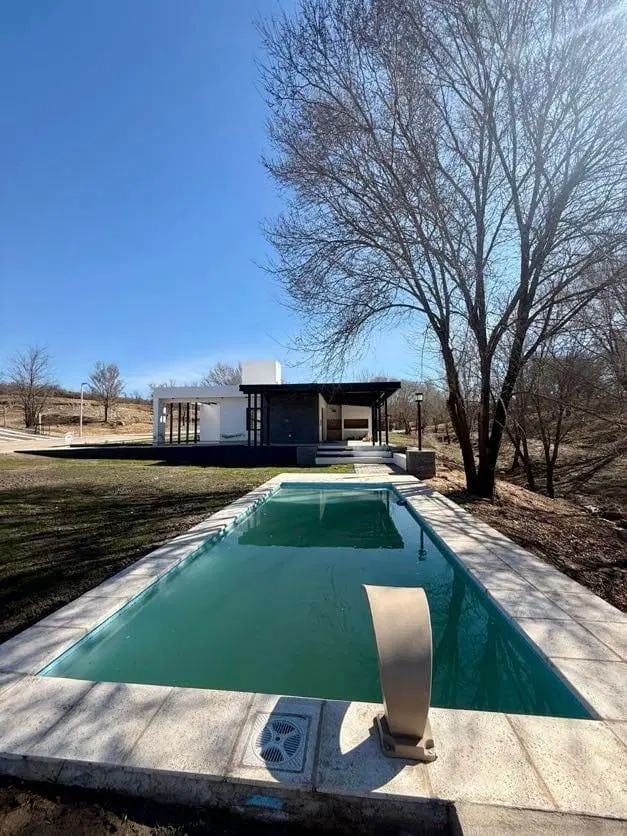 VENTA DE CASA A ESTRENAR EN ALTOS DE CARLOS PAZ 3 DORMITORIOS 1
