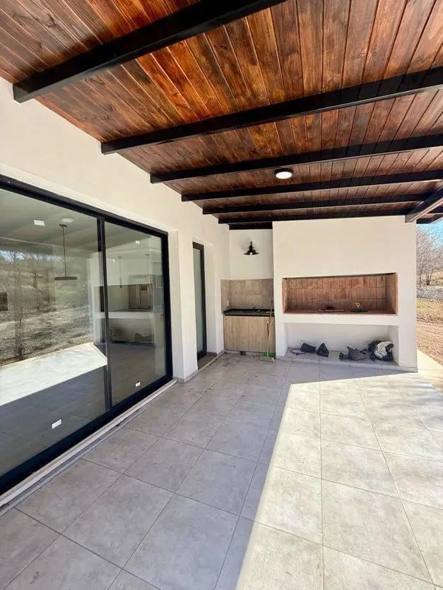 VENTA DE CASA A ESTRENAR EN ALTOS DE CARLOS PAZ 3 DORMITORIOS 4