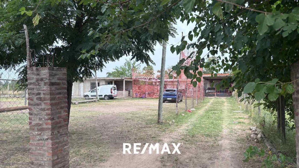 Foto de VENTA CASA CON DOS LOTES DERQUI PILAR, imagen 4