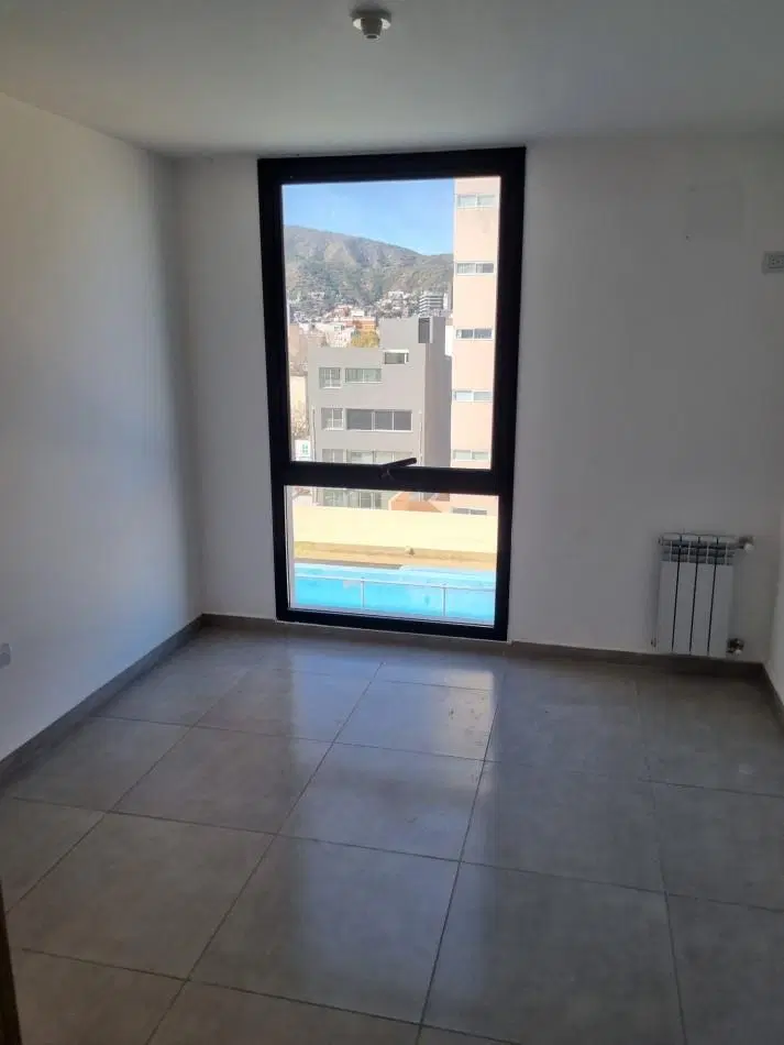 ALQUILER ANUAL DPTO 2 DORMITORIOS, 2 BAÑOS Y COCHERA CENTRO VILLA CARLOS PAZ 4