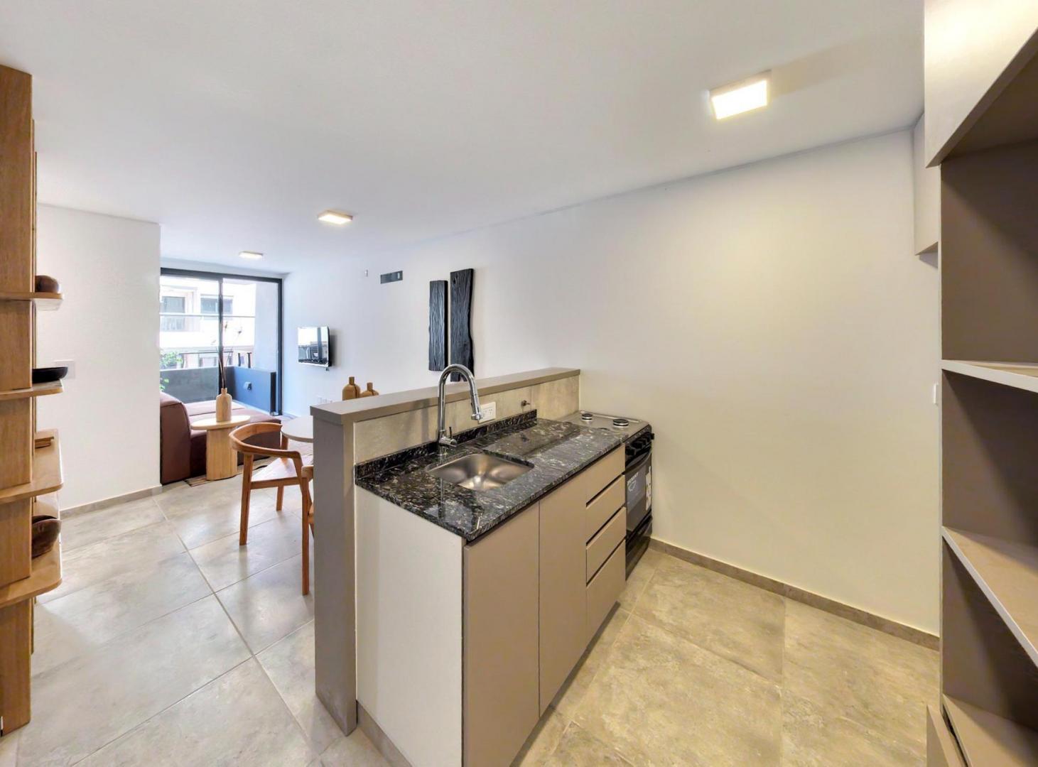 Foto de SE VENDE DEPARTAMENTO A ESTRENAR AMOBLADO DE 1 DORMITORIO EN EL CENTRO, imagen 4