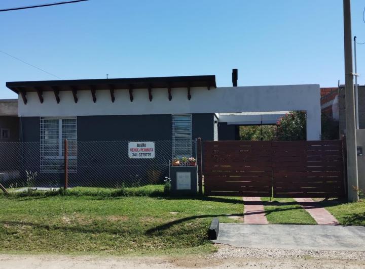 CASA CON JARDIN, TRANQUILIDAD Y CERCANIA A LA CIUDAD. 1