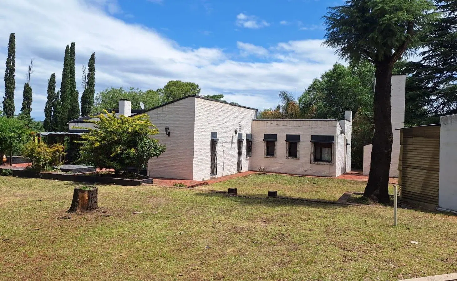 CASA EN VENTA EN SIQUIMAN SOBRE RUTA 38 MAS LOCAL COMERCIAL Y PISCINA PARQUE DE 5000 MS 8