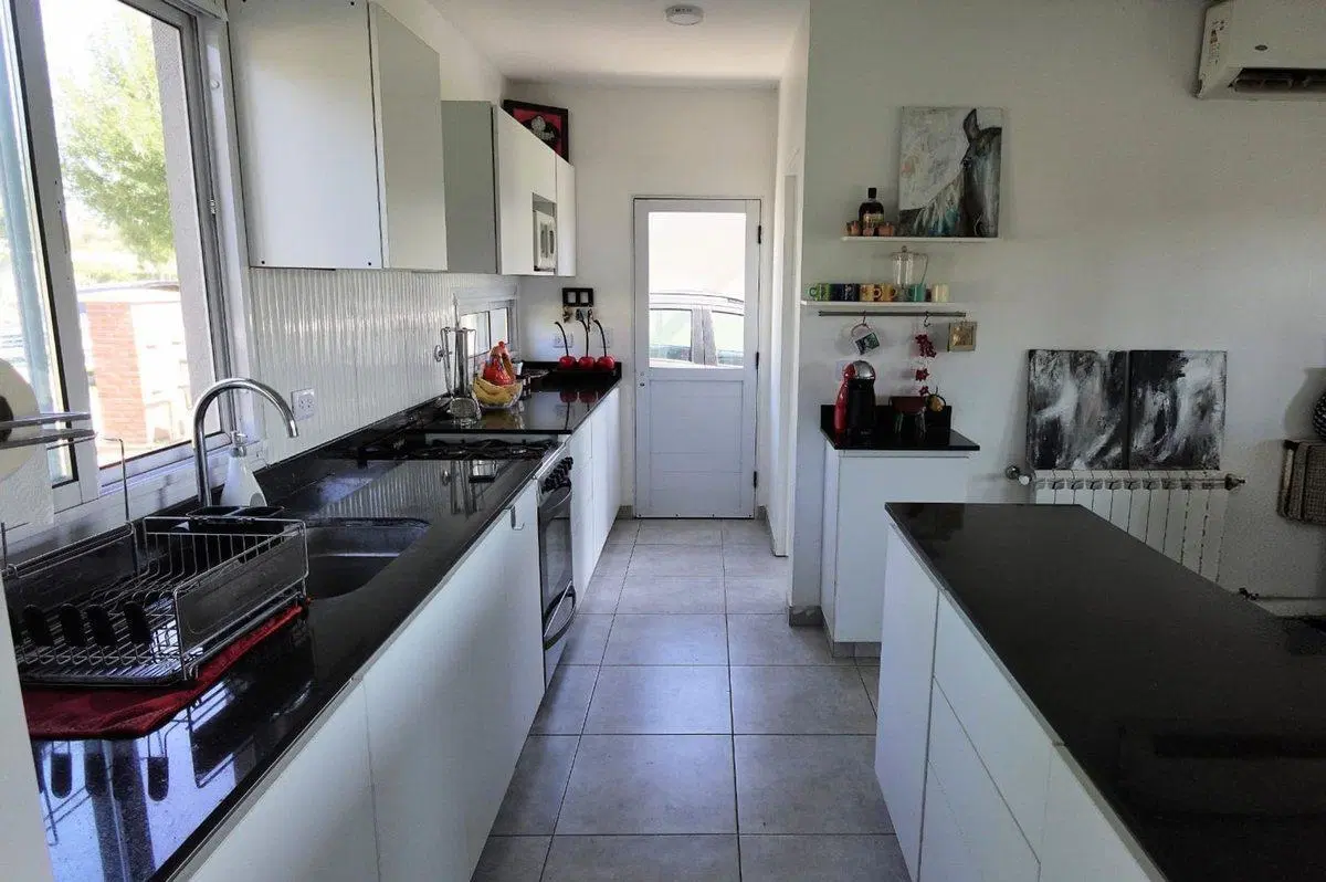 VENTA CASA 5 AMBIENTES PILAR BARRIO SANTO TOMAS 4