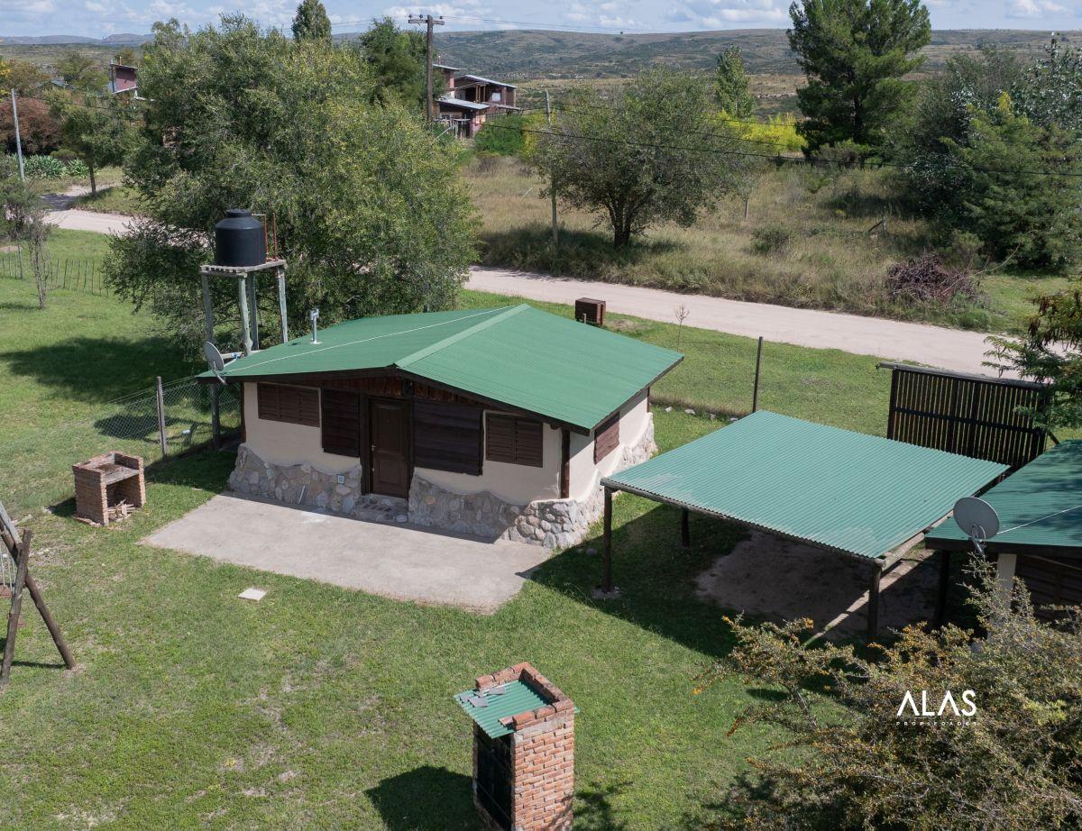 Foto de Dos cabañas en venta con 897 m² de terreno en Los Quimbaletes, Villa Giardino, imagen 1