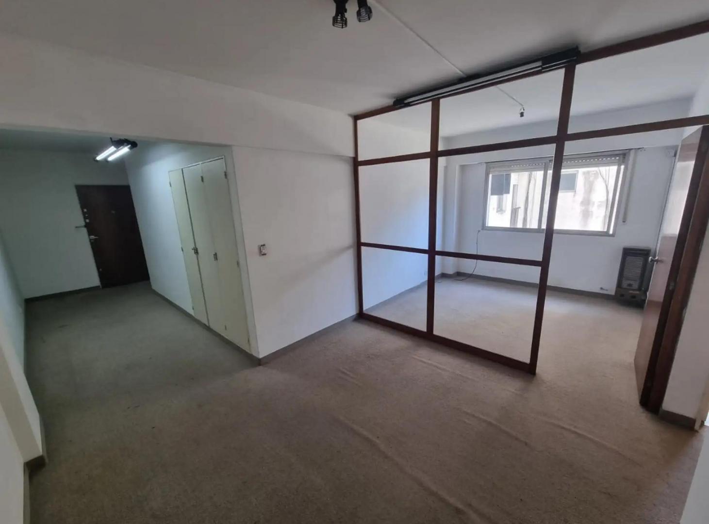 departamento 36 mts monoambiente en L con cocina y baño completo.