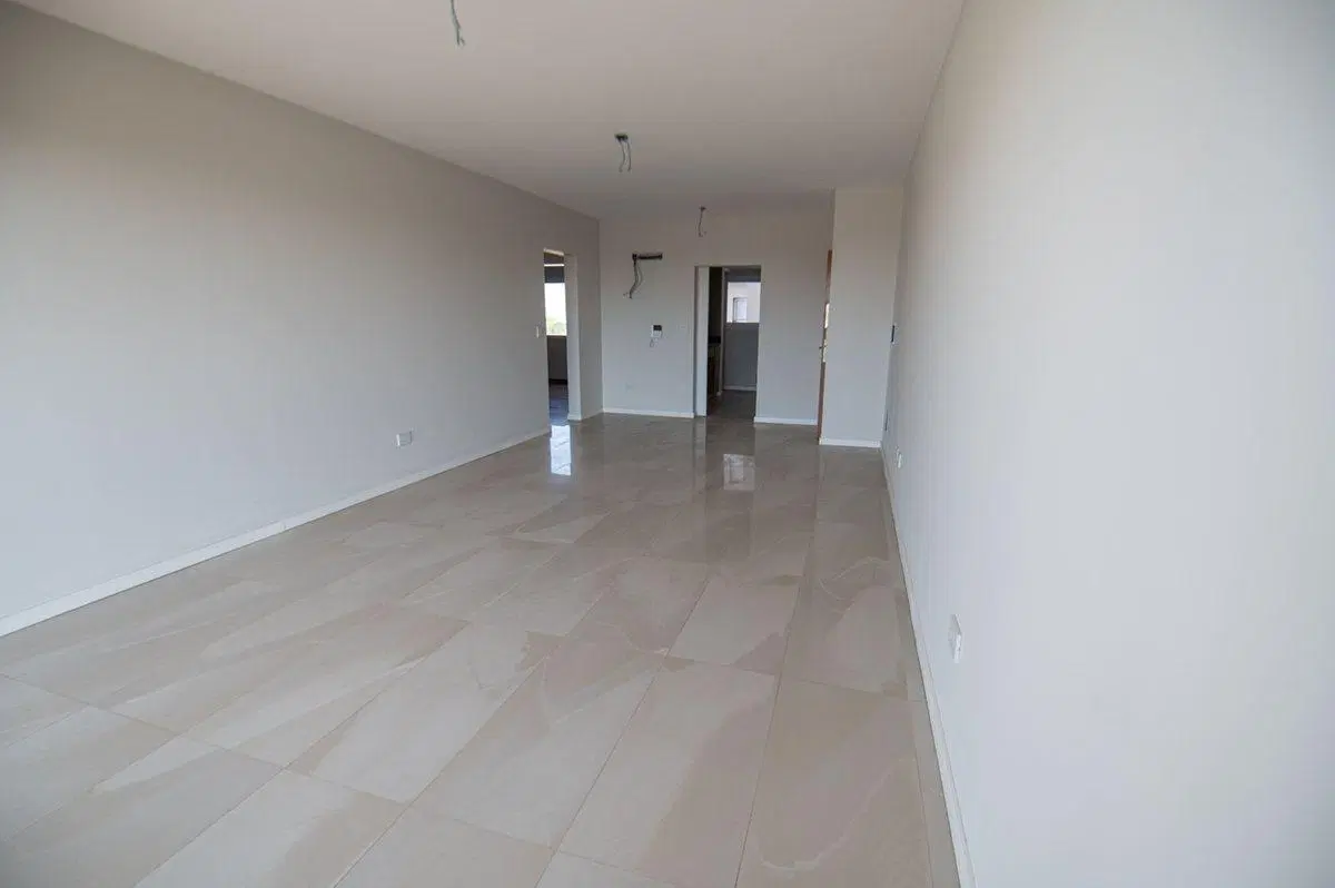 VENTA DEPARTAMENTO DE 2 DORMITORIOS C/COCHERA 4