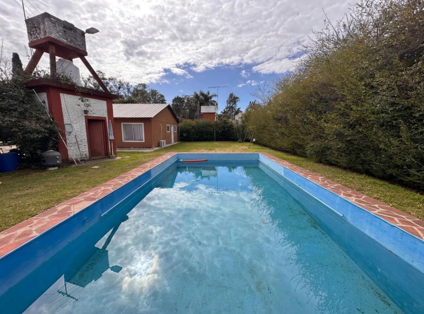 Foto de VENTA DE CASA MULTIFAMILIAR CON PILETA EN BARRIO MONTECARLO DEL VISO, imagen 2
