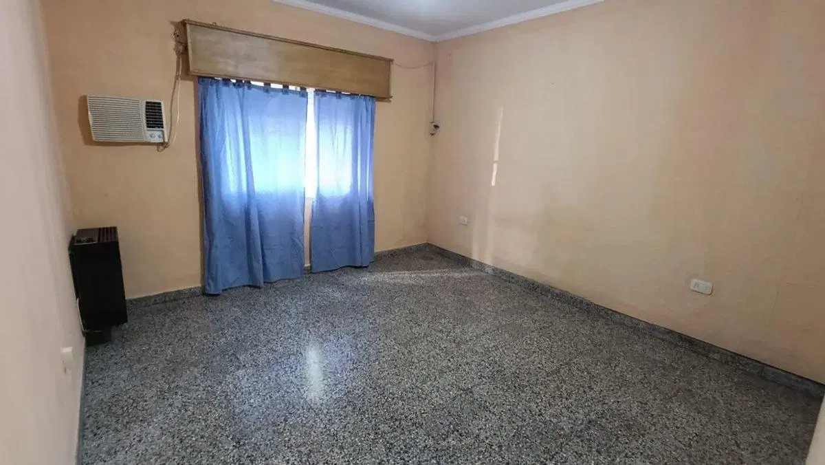 Venta casa 2 habitaciones con quincho y jardín 4