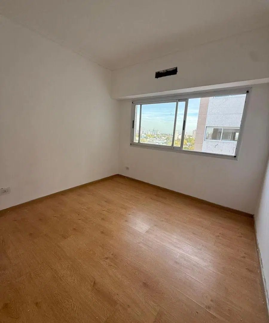 Departamento dos ambientes con balcon y cochera. 4