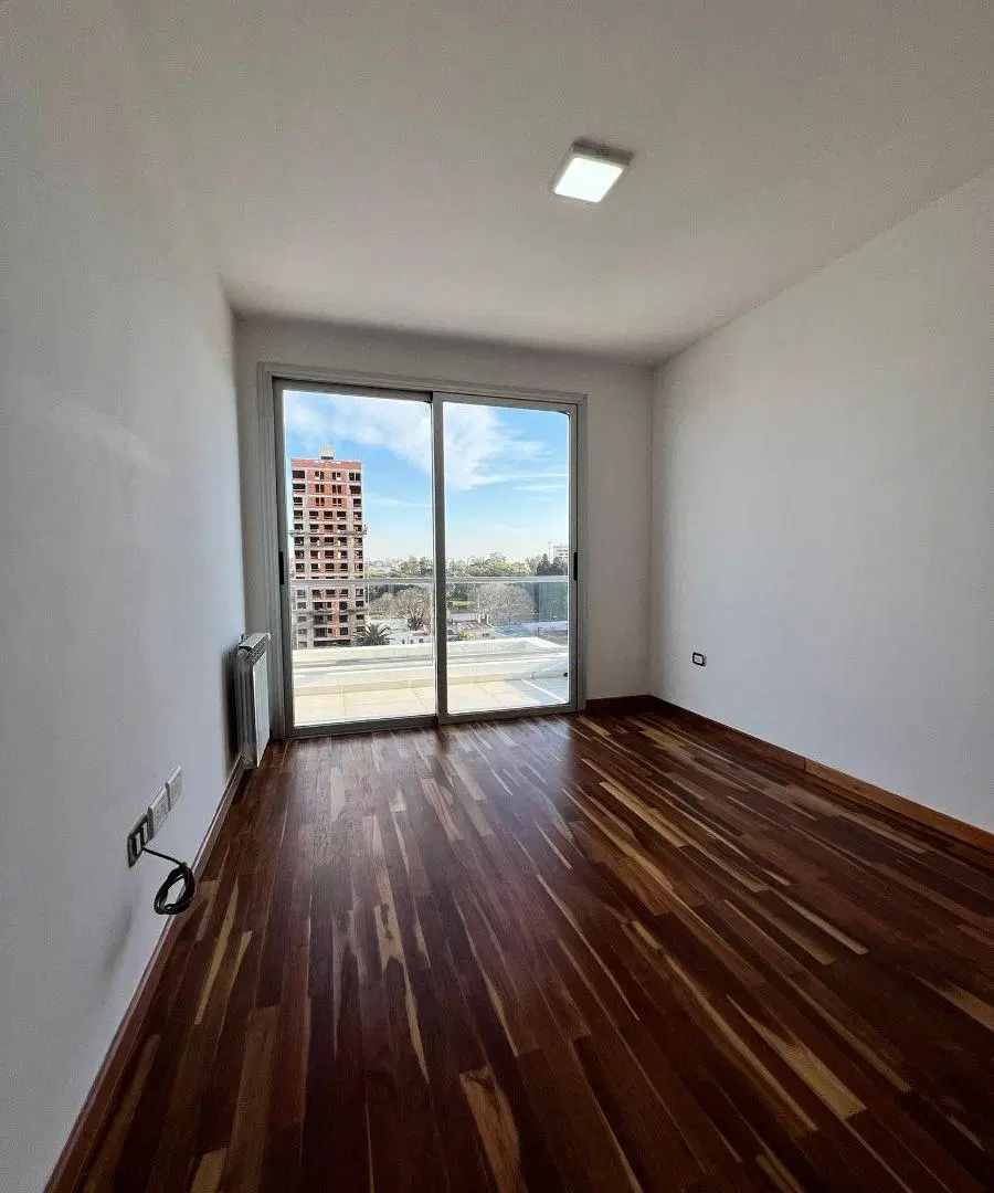 Departamento de dos dormitorios con cochera en alquiler 5