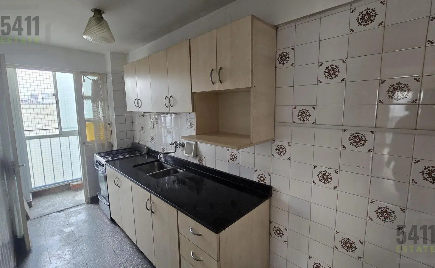 Venta Departamento 3 ambientes con Balcon piso alto vista abierta en Flores 4