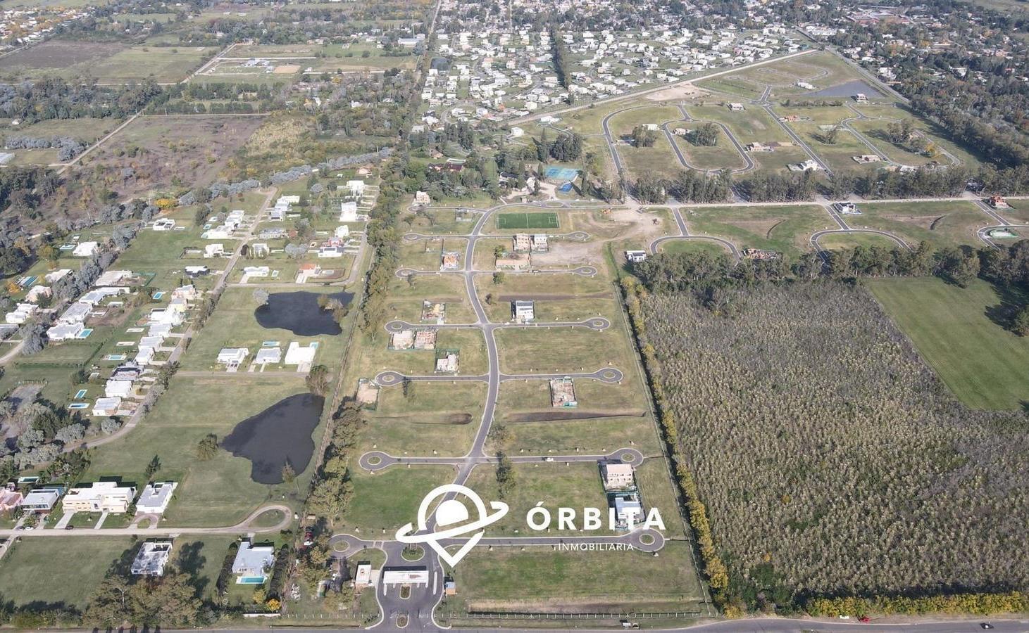 Foto de Lote en venta en Barrio Santa Sofia, Pilar del Este, con fondo verde, imagen 1