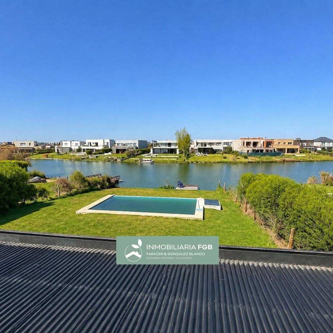 Foto de Casa a la laguna en Alquiler en Barrio Norte | El Cantón | 3 dorm |, imagen 1