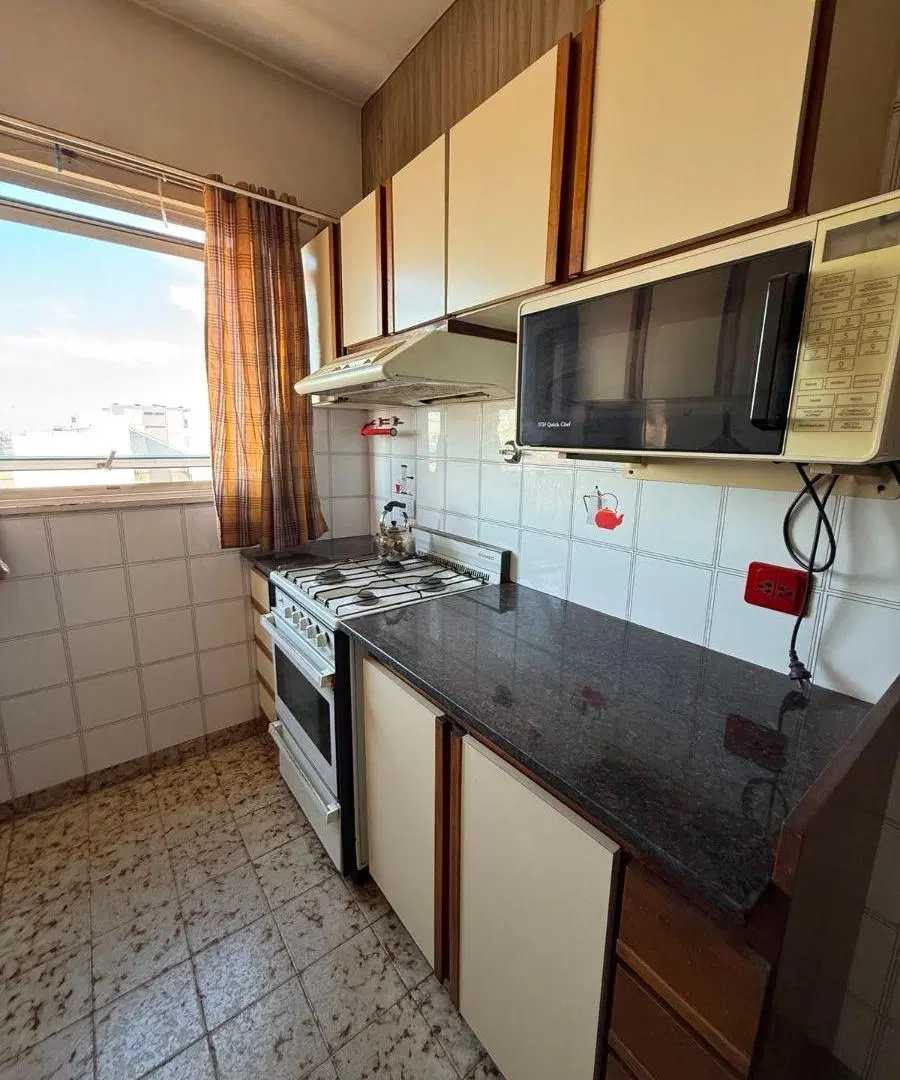 Departamento de 4 Ambiente en Edificio al Frente con dos Cocheras Cubiertas Fijas y Baulera 5