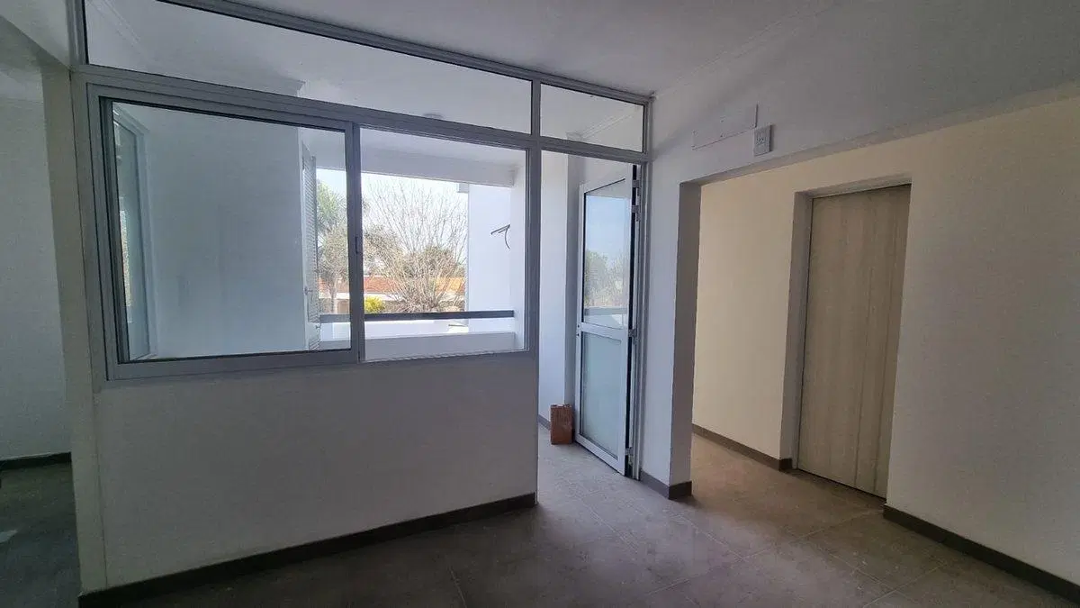 DEPARTAMENTO DE 2 DORMITORIOS CON COCHERA Y PATIO 5