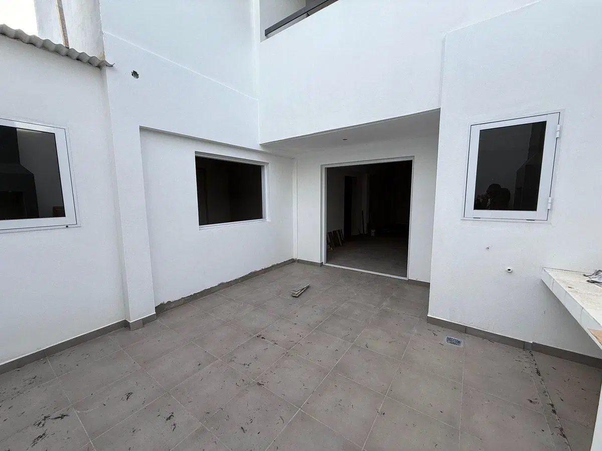 DEPARTAMENTO DE 2 DORMITORIOS CON COCHERA Y PATIO 2