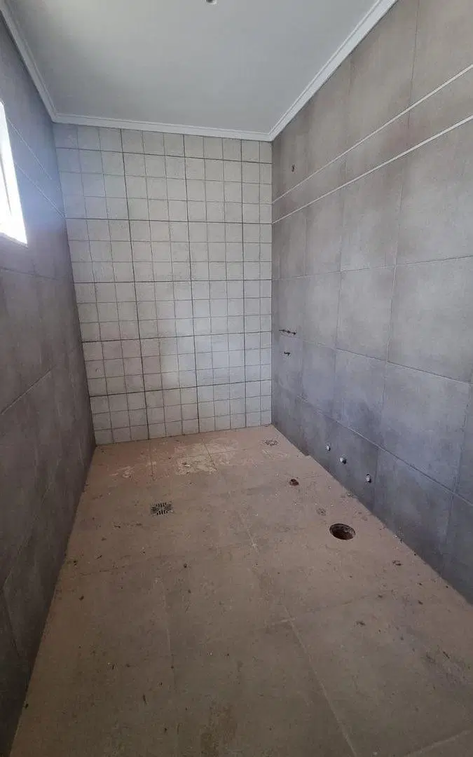DEPARTAMENTO DE 2 DORMITORIOS CON COCHERA Y PATIO 3