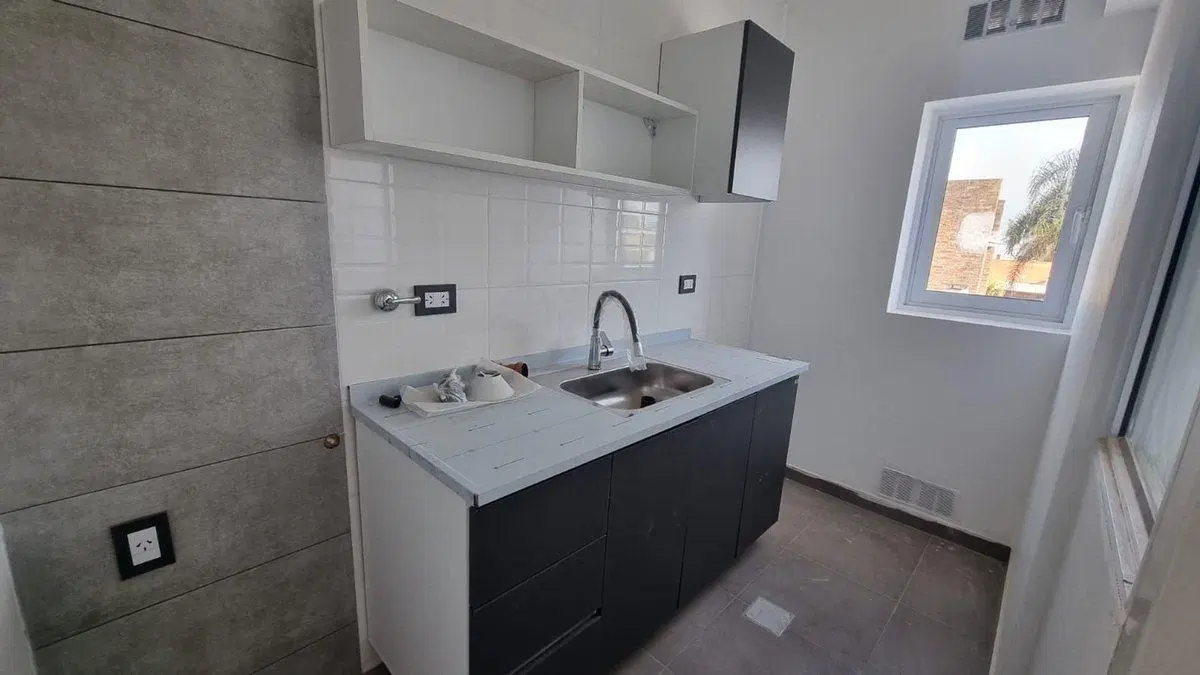 DEPARTAMENTO DE 2 DORMITORIOS CON COCHERA Y PATIO 5