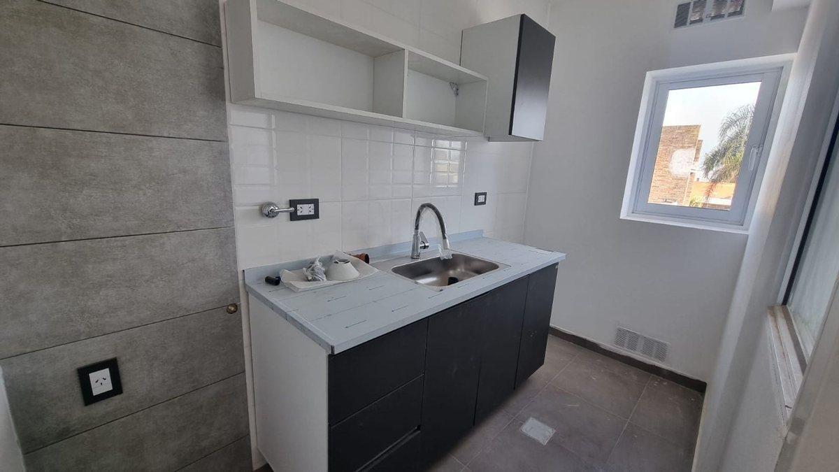 Foto de DEPARTAMENTO DE 2 DORMITORIOS CON COCHERA Y PATIO, imagen 4
