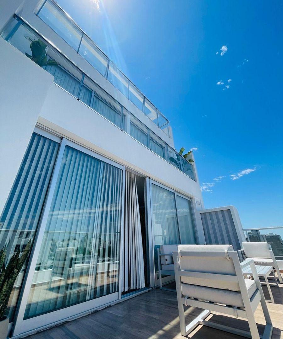 TRIPLEX EN VENTA 40 11 Y 12