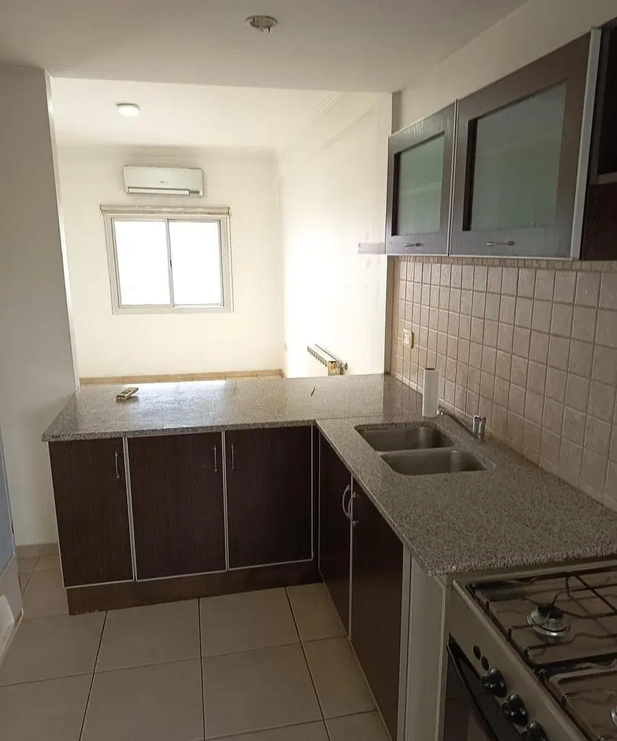 Departamento de 2 dormitorios con Cochera y Terraza Propia. Avenida 19 y 48. 3