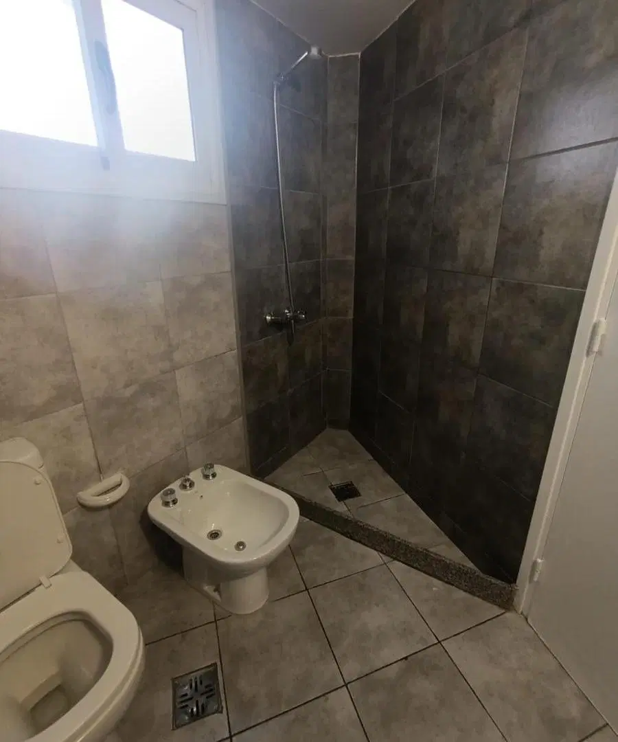 Departamento 1 dormitorio en planta baja con  patio en b° general paz 8