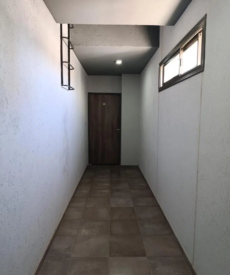 Departamento 2 dormitorios con balcón y cochera 4