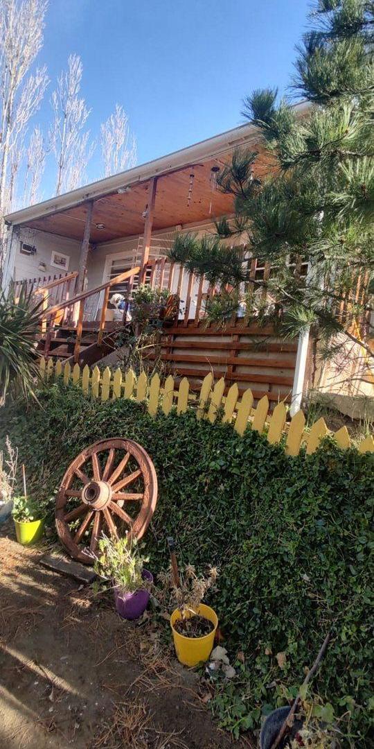 CASA EN LOTE PARQUIZADO