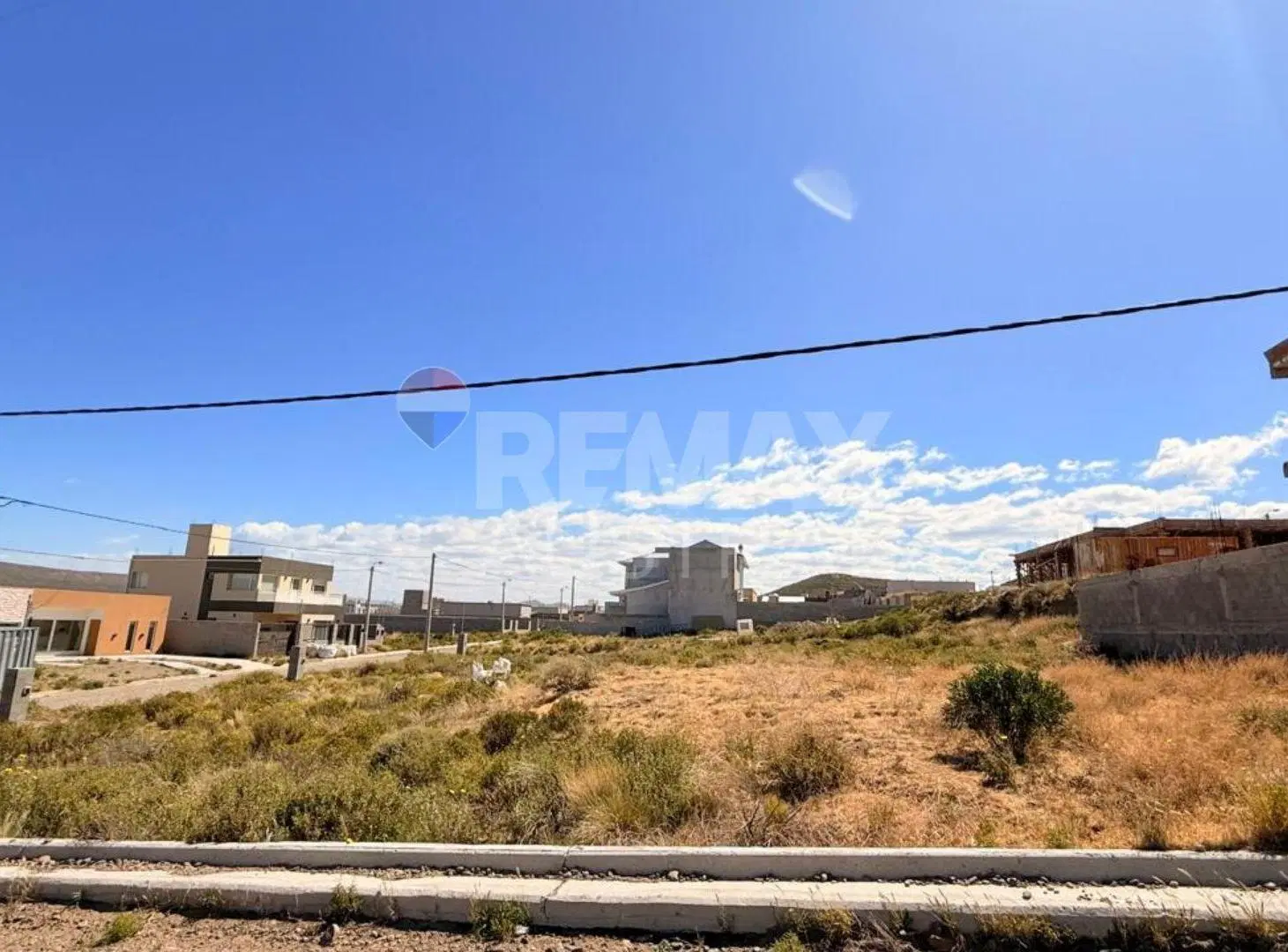 LOTE EN BARRIO CERRADO 5