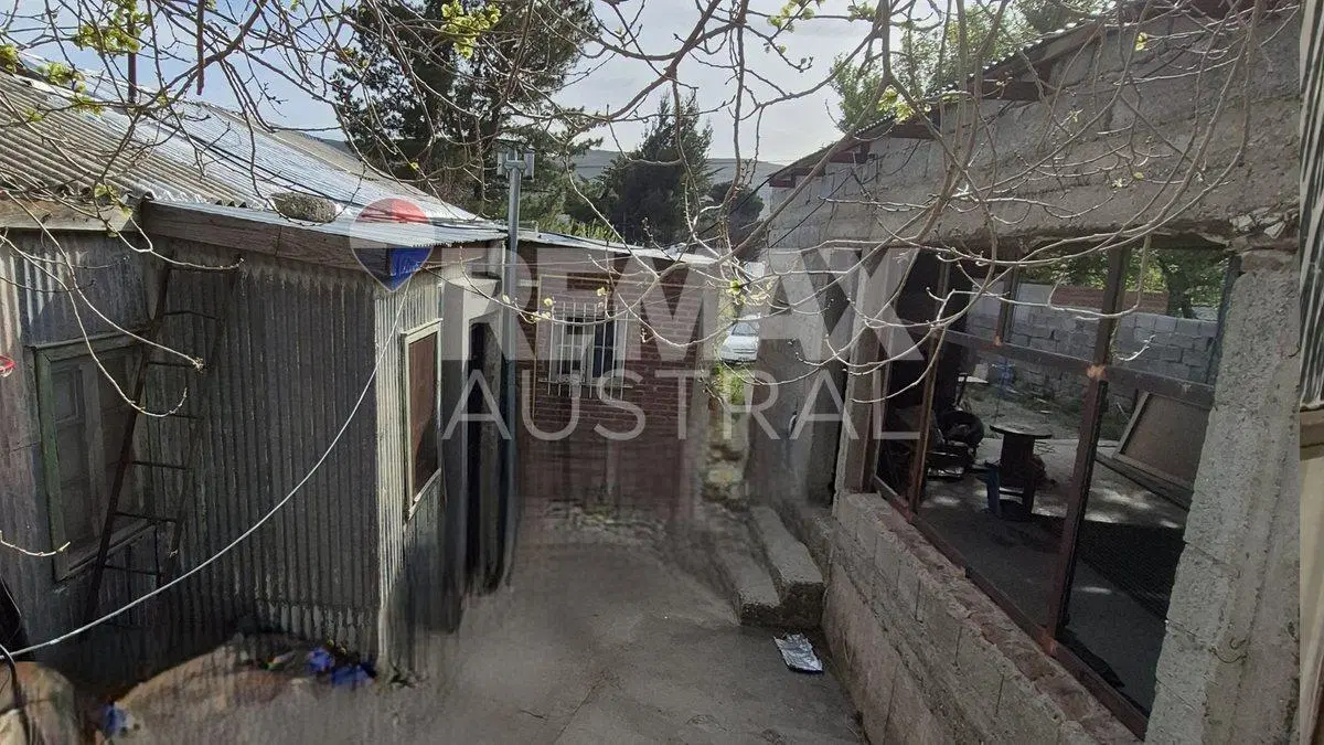 Lote con  vivienda a refaccionar 5
