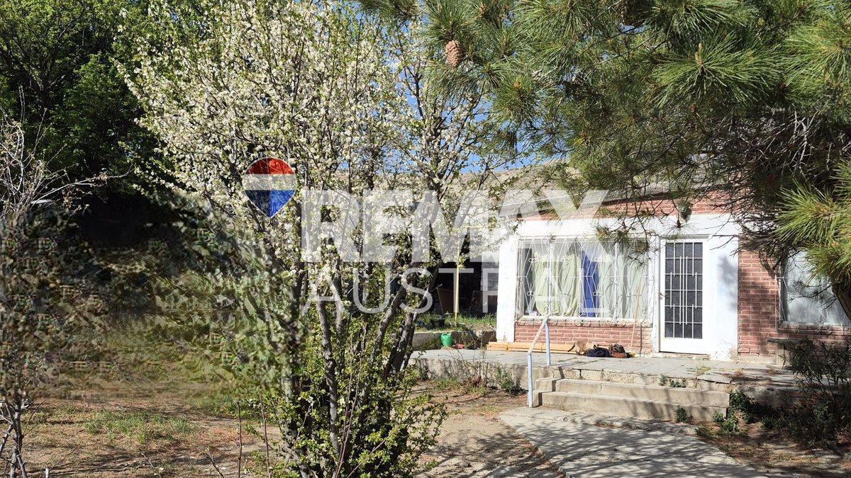 Lote con  vivienda a refaccionar