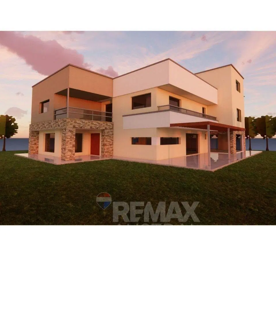 Lote con construcción a terminar 2