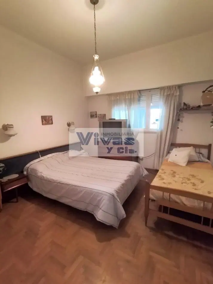 CHALET 3 AMBIENTES CON GARAGE PARQUE Y QUINCHO 2